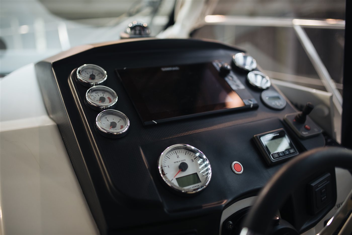 Boat helm panel with engine gauges, display and controls