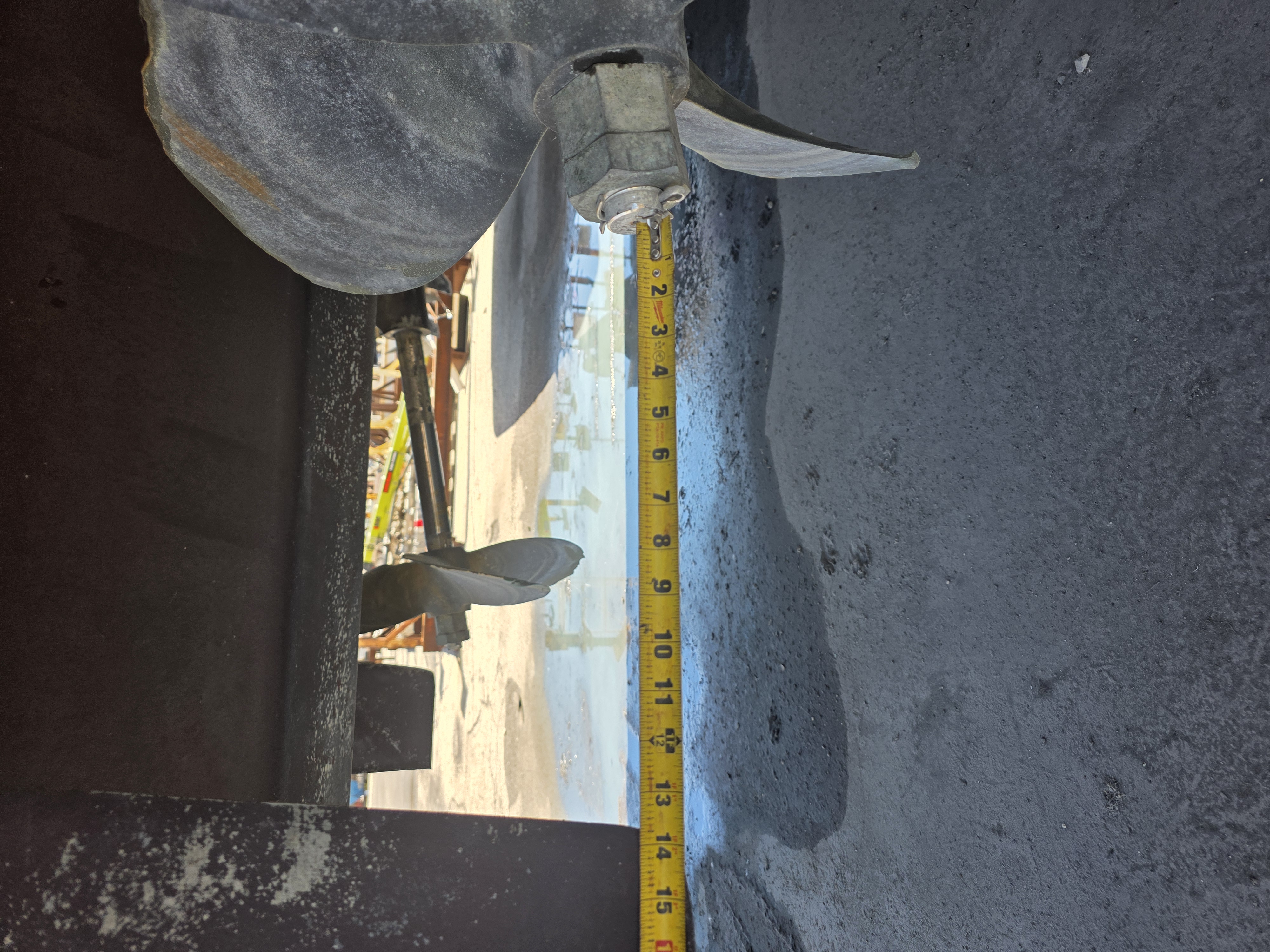 Propeller clearance being measured during a vessel inspection
