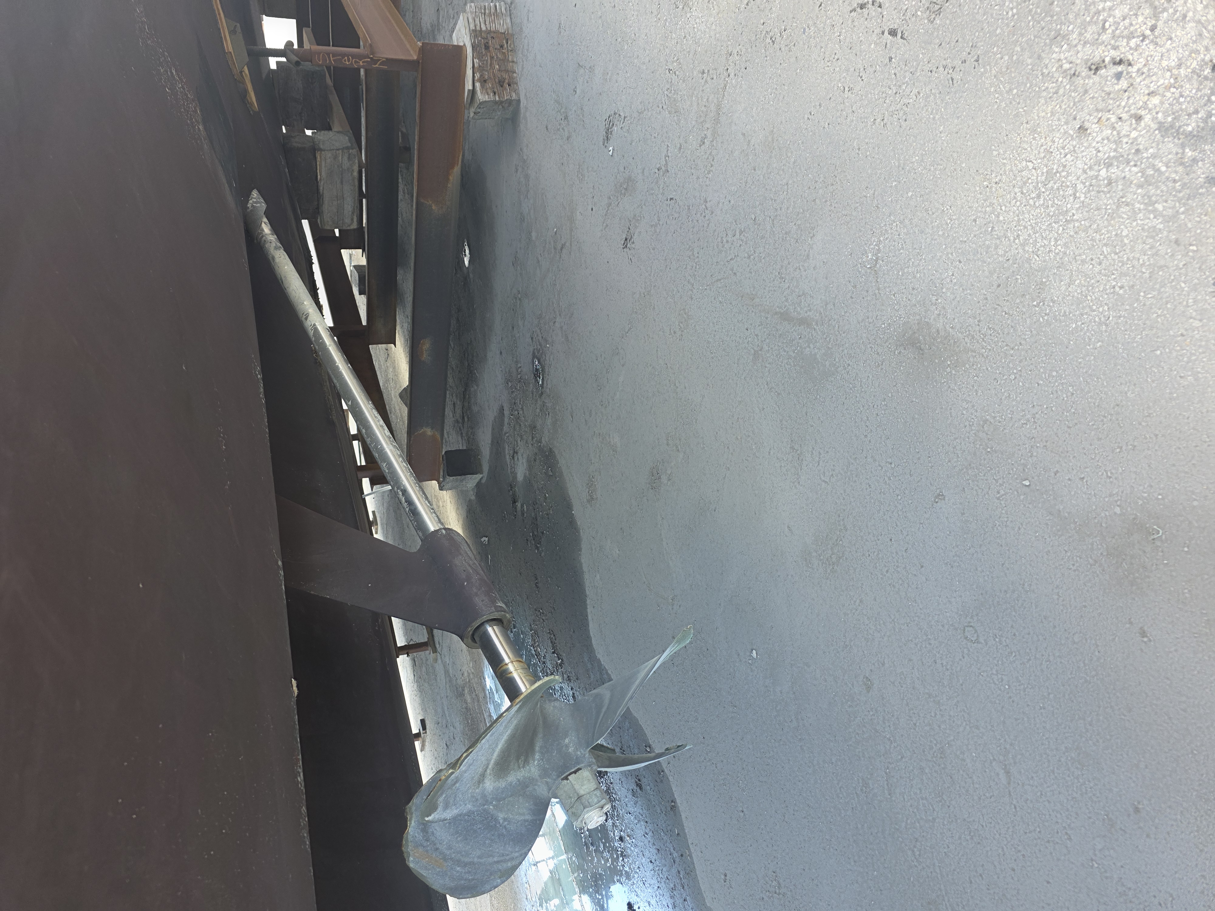 Propeller shaft and hull inspected while the vessel is blocked ashore